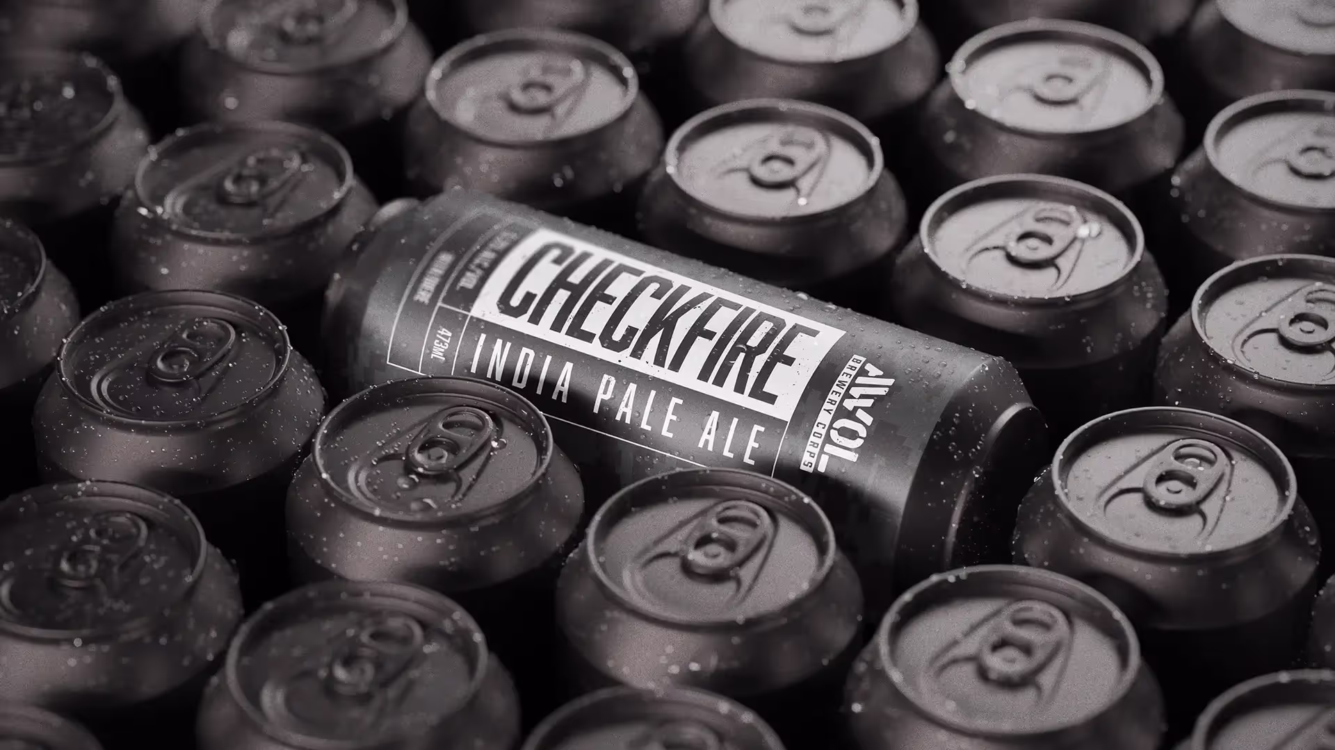 AWOL Brewery's Checkfire IPA beer can resting on top of a flat of other beer cans.